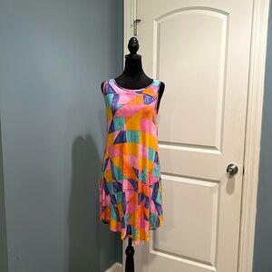 Medium Dress 👗 with Pockets! Stain on the back. Noted in picture.